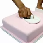 Lisseur de  surface de gâteaux pâte à sucre et pâtisserie