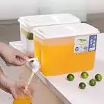 Bouilloire plastique froide à robinet avec ou sans support.
